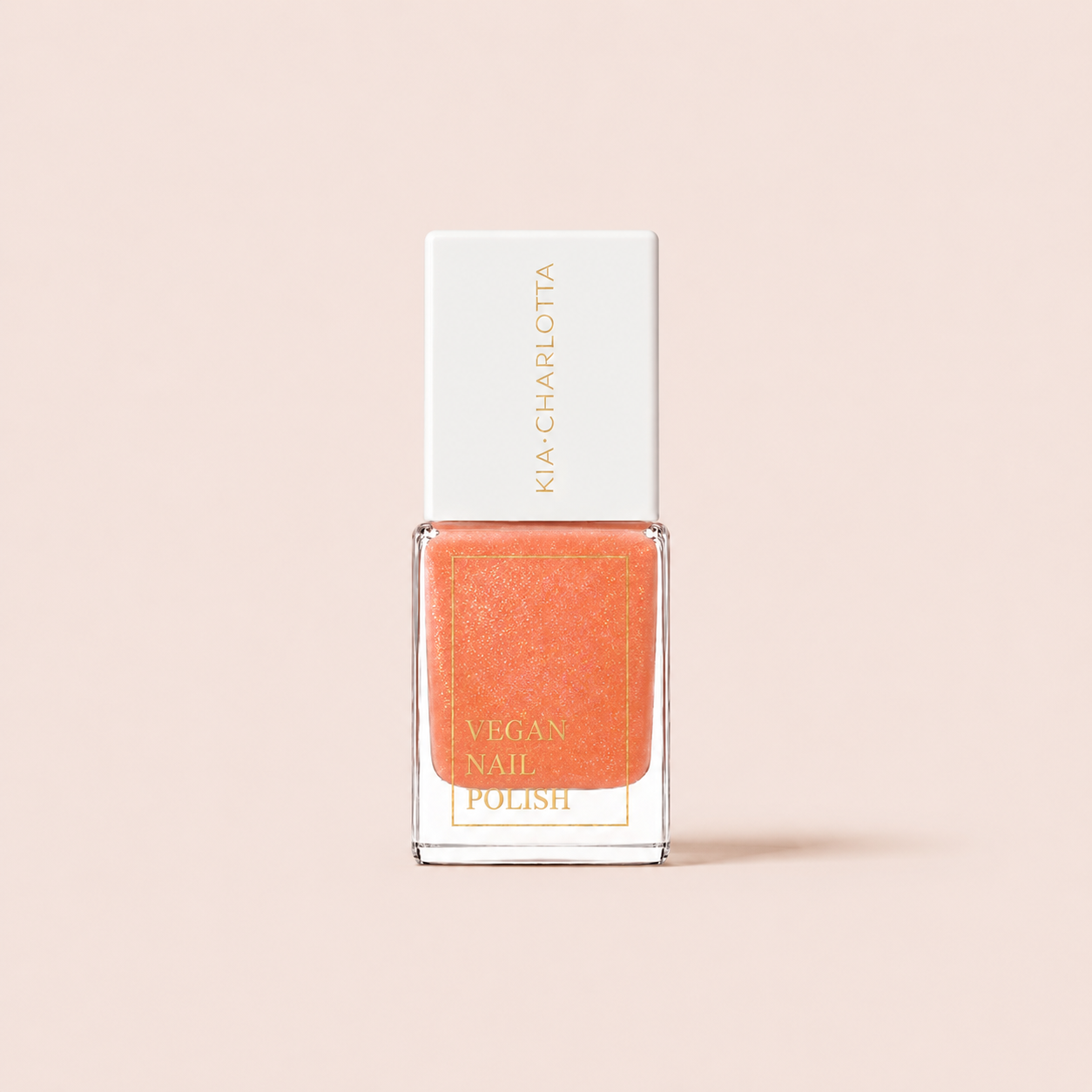 kia-charlotta-warm-words-veganer-nagellack-orange-schimmer image 1