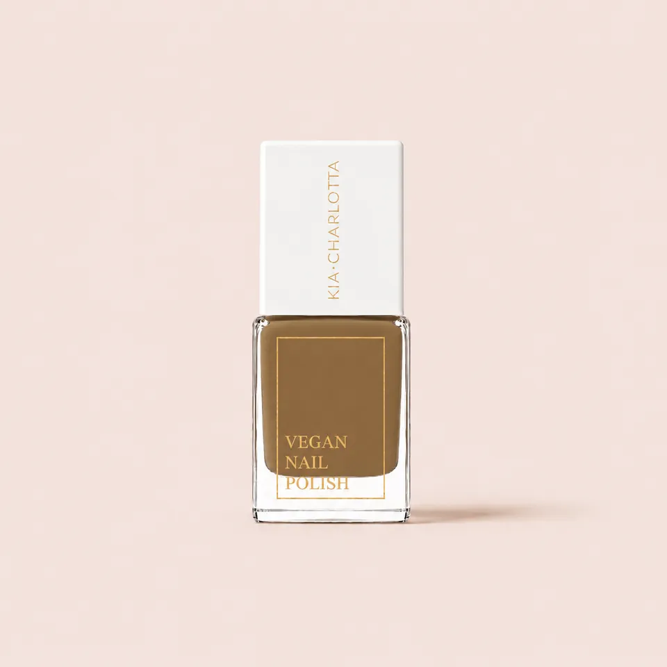 kia-charlotta-nature-stories-veganer-nagellack-ocker-gelb-gl-nzend image 1